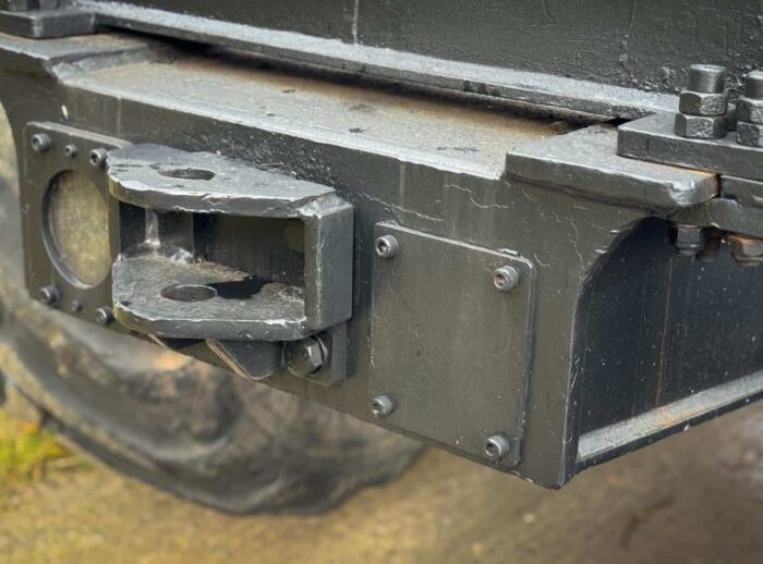 Forwarder John Deere 1210E hinten am Anhänger Forwarder John Deere 1210E tył naczepy