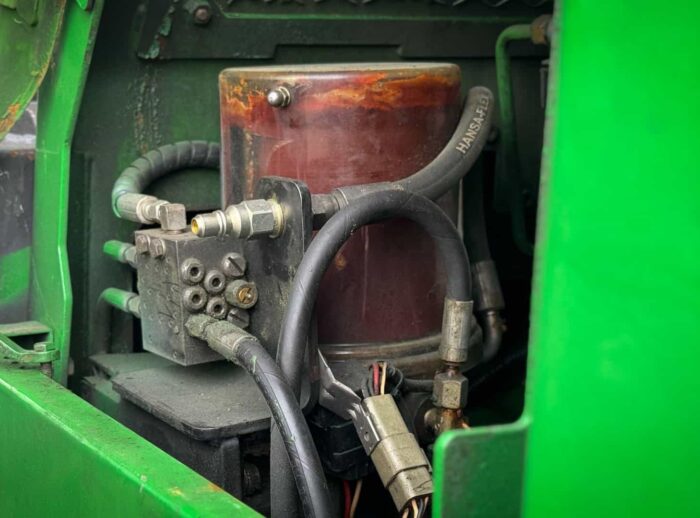 John Deere 1210E Zentralschmierung John Deere 1210E Centralne smarowanie